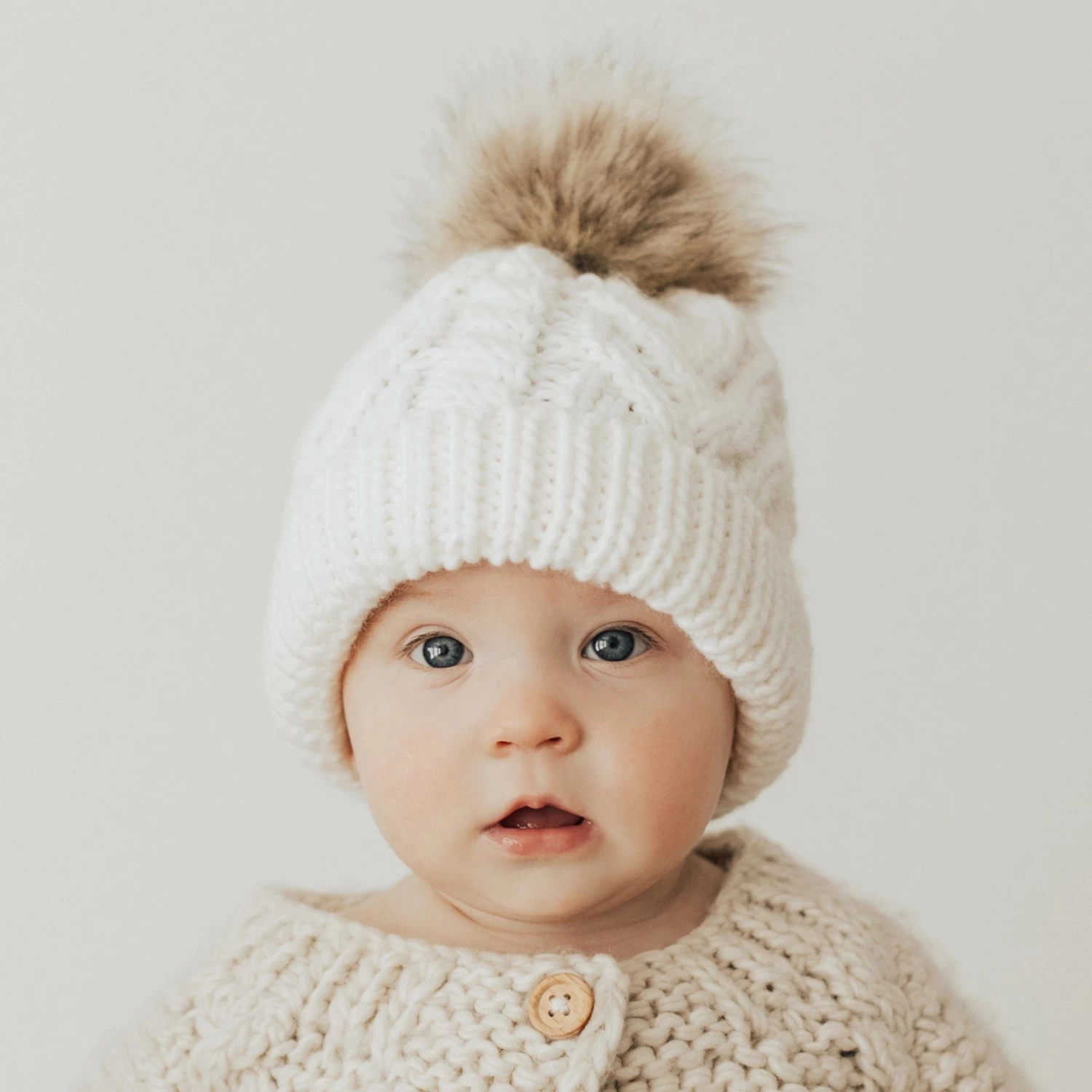 Winter White Pop Pom Pom Beanie Hat 5 Winter White Pop Pom Pom Beanie Hat - Image 3